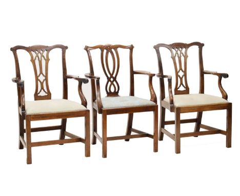 Three Chippendale-style mahogany dining chairs, each with upholstered drop in seats, raised on squared front supports, 58cm (