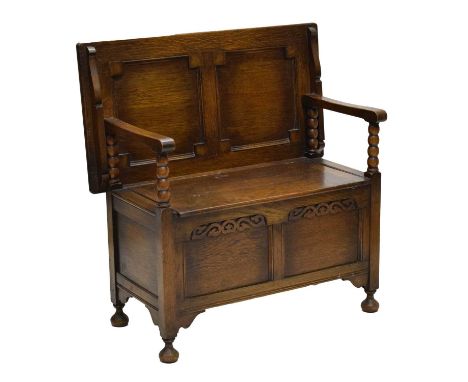 Late 20th century reproduction oak Monk's Bench with carved decoration, 91cm wide x 92cm high