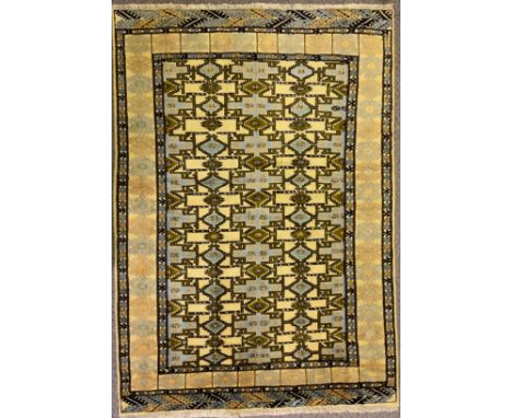 A Turkman Middle Eastern woollen carpet, 180cm x 124cm 