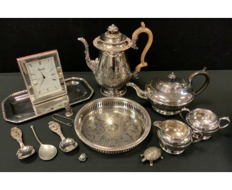 A 19th century EPBM coffee pot, embossed with foliate scrolls, c.1890;  an EPNS three piece tea service;  etc 