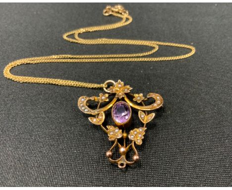 An Edwardian pale pink amethyst and seed pearl pendant necklace, stamped 9ct, 4,5g gross. 