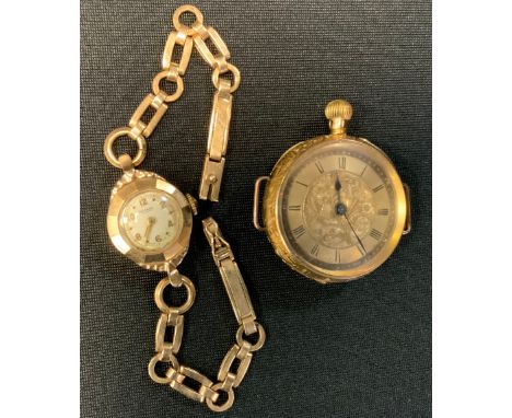 An early 20th century 18ct gold cased pocket watch converted wristwatch, gilt dial, Roman numerals button wind movement, base