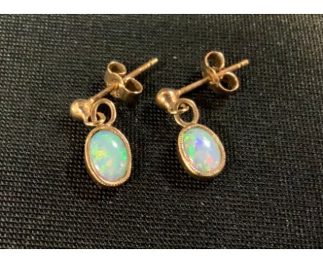 A pair of oval opal drop earrings 