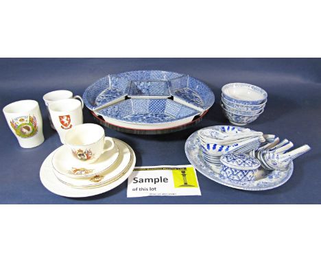 A collection of blue and white oriental soup or rice bowls with side plates serving spoons, etc together with a lazy susan wi