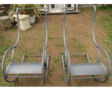 In the manner of R W Winfield, a pair of good quality contemporary heavy gauge grey painted steel garden rocking chair frames