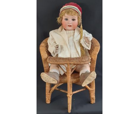 Early 20th century German bisque head character doll by Ernst Heubach (mould 300.12), with 5 piece bent limb composition body