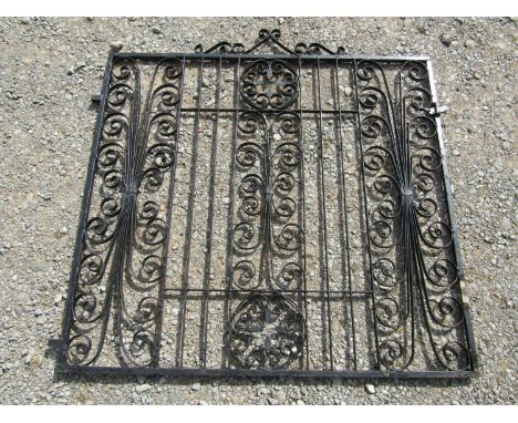 A pair of painted iron entrance gates with decorative open scroll detail, 272 cm wide x 137 cm high together with a matching 