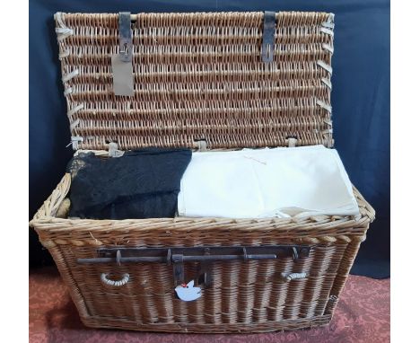 Large vintage wicker hamper filled with white table and bed linen including damask cloths, napkins, decorative mats, a pair o