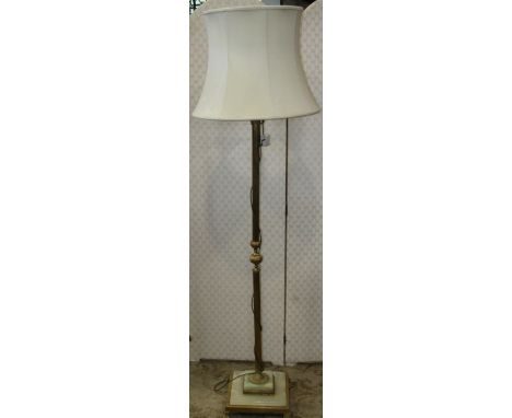 A brass and onyx lamp standard on stepped base with lions paw feet, complete with shade 