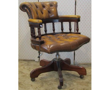 Reproduction style office chair with tan coloured button back 