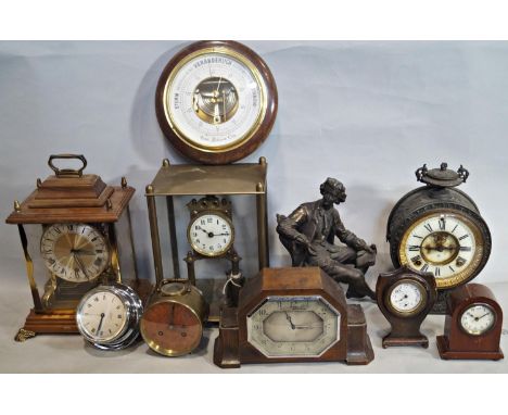 A miscellaneous collection of small clocks including a mantle clock in timber, a small chrome bulkhead clock, a number of lon