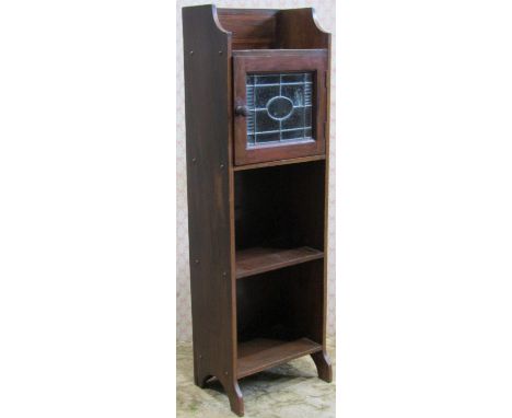 Small Edwardian mahogany bookcase partially enclosed by a leaded light door with inlaid detail, 30cm W x 22 D x 97 H 