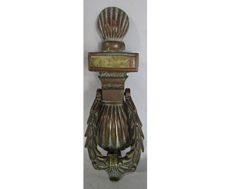 An old brass door knocker 24cm. 