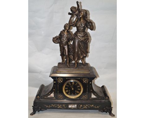 A Victorian black slate and marble mantle clock with figural surmount of a mother and two children, with eight day striking m