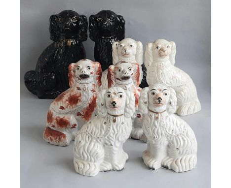 Four pairs of ceramic Staffordshire spaniels height range 26 - 34cm 