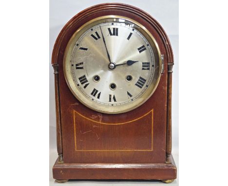 An inlaid Edwardian mahogany mantle clock with string inlaid detail and three train striking movement 
