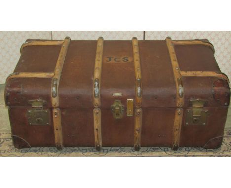 A vintage brown fibre timber lathe bound and leather re-enforced cabin trunk with brass fittings 95 cm long x 55 cm wide x 36