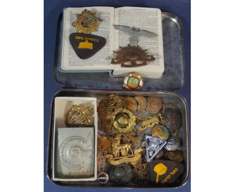 A miscellaneous collection of British and Commonwealth military regiment cap badges, buttons, etc; enamelled silver RAF sweet