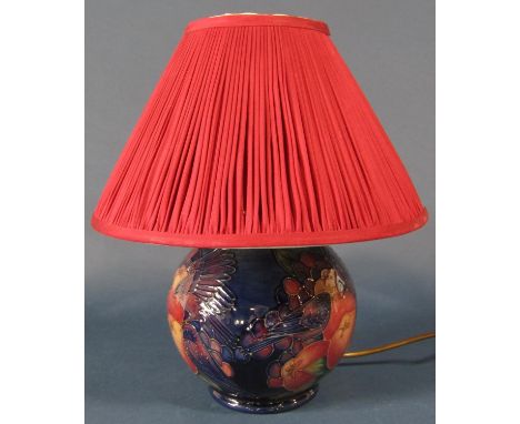 A Moorcroft Pottery 'Blue Finches' pattern table lamp base and red shade, 17cm tall approx (excluding shade and fittings) 33c