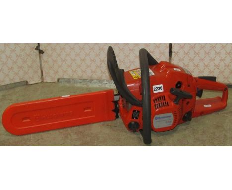A Husqvarna 236 petrol chainsaw (used) but appears in good condition 