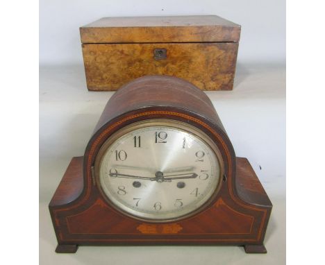 A 19th century walnut writing/sewing box with a fitted interior, 30cm wide and a mahogany cased mantel clock. 
