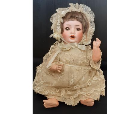 Small bisque head character doll 'Hanna' circa 1920 by Schoenau &amp; Hoffmeister, with 5 piece bent limb composition body, c