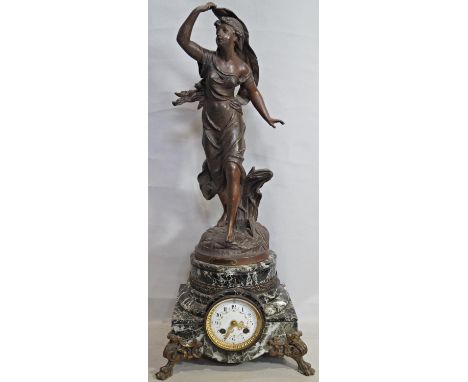 A 19th century French marble mantle clock, the base enclosing an eight day striking movement with painted enamel dial, surmou