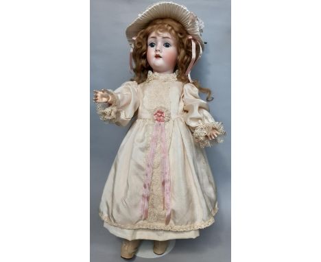 Early 20th century large German 'Walkure' bisque head doll, by Kley &amp; Hahn, mould 61, with closing blue eyes, pierced ear
