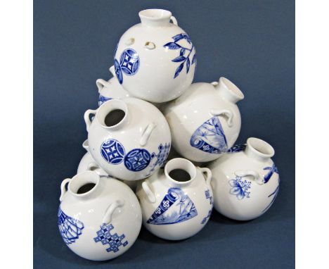 A blue and white Worcester posy vase in the form of 10 small two handled pots forming a pyramid, 21cm tall x 21cm at base, wi