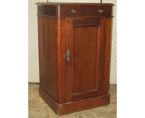 A Victorian mahogany pedestal washstand, the hinged lid with mock frieze drawer enclosing a ceramic basin over a panelled cup