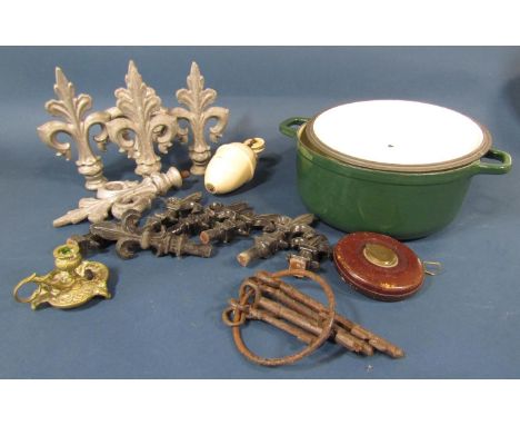 A miscellaneous collection of items including a cast iron green Chasseur saucepan, a giant magnifying glass, hour glasses, a 