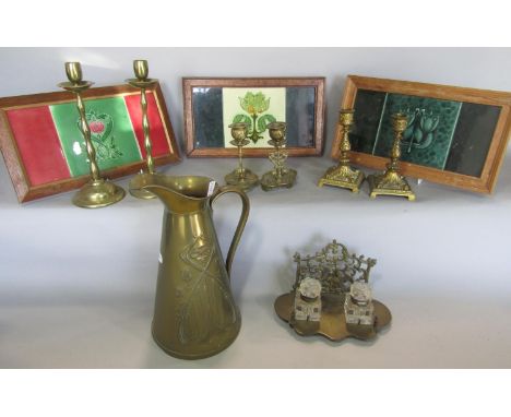 An Arts and Crafts brass pitcher 28.5cm high stamped J S &amp; S to the base, three pairs of brass candlesticks , a brass pen