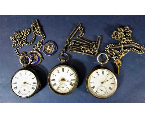 Three Victorian silver cased pocket watches (all af) together with three silver Albert chains, two silver and enamel fobs and