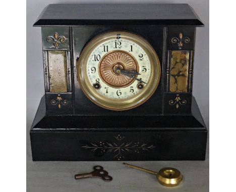 A Victorian black slate and marble mantle clock with decorated dial by the Ansonia Clock Co 