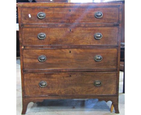 A Regency mahogany caddy top chest of four long drawers on swept supports with string banded inlay and brass string handles, 