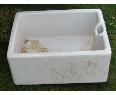 A reclaimed Astra Cast white glazed stoneware butlers sink of rectangular form, approx 60 cm long x 46 cm wide x 26 cm high, 