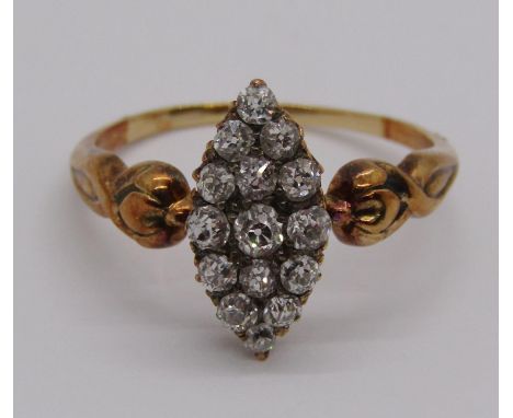 Edwardian 15ct diamond marquise cluster ring, ring head 1.5cm L approx, size Q/R, 3.6g 