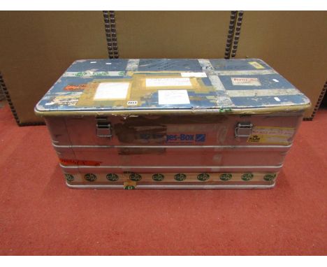A tropical trunk in aluminium containing a large quantity of eastern copper and brass wares, pots, pans, dishes, vases, etc 