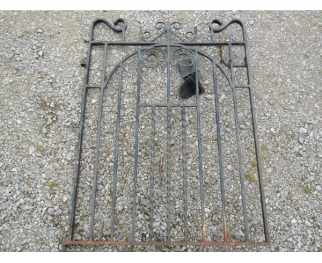 A small iron pedestrian gate with simple scroll and further detail 3ft wide approximately 