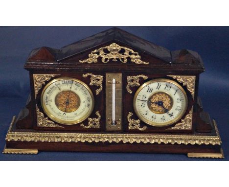 An Edwardian clock / barometer / thermometer, set within a polished timber case with applied brass mounts 