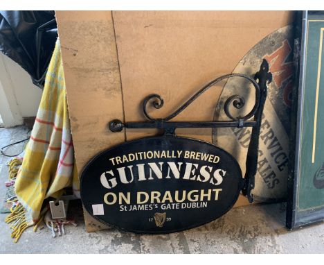 CAST METAL BRACKET WITH DOUBLE SIDED GUINNESS SIGNAGEWe highly recommend that you view in person any potential purchase and t