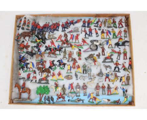 Figures: A collection of assorted lead figures to include: horseback, animals, footballers and more. Johillco and other examp