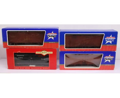 Model Railway: A collection of four boxed rolling stock, to comprise: three USA Trains examples and one Bachmann 93471 Tank C