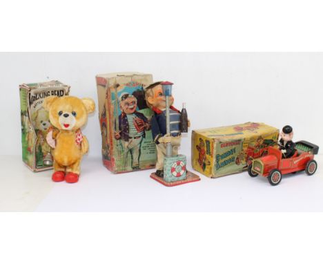 Tinplate: A collection of three boxed tinplate items to comprise: The Drinking Captain, Old Timer Sunday Driver, and Walking 