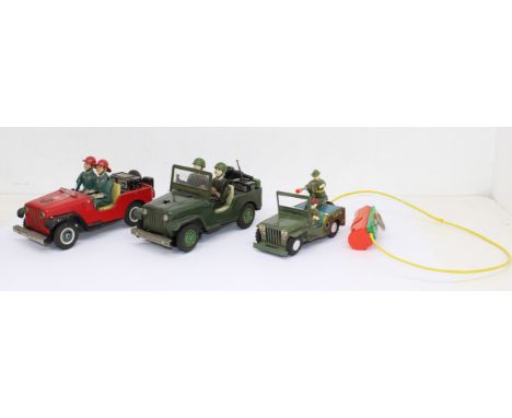 Tinplate: A collection of three unboxed tinplate battery operated vehicles to comprise: Nomura (TN) Army Jeep, slight rusting