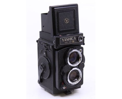 Yashica: A Yashica Mat-124 G, TLR medium format camera body, 132562, generally appears in good order. Shutter appears in work