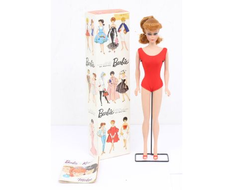 Barbie: A boxed Mattel, Barbie, 'Genuine Teen Age Model', Redhead with Ponytail, Stock No. 850. Original box, tape repair to 
