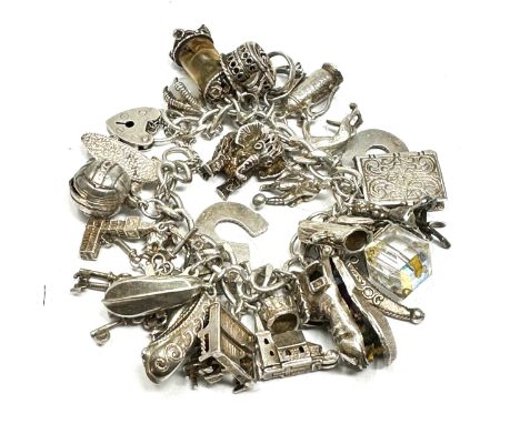 A Vintage Silver Charm Bracelet With Assorted Charms (98g) 