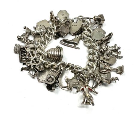 A Vintage Silver Charm Bracelet With Assorted Charms (112g) 