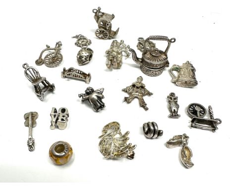 20  vintage silver charms weight 52g 
